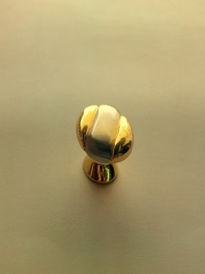 BOTON TRAMP ORO/NS AS 324
